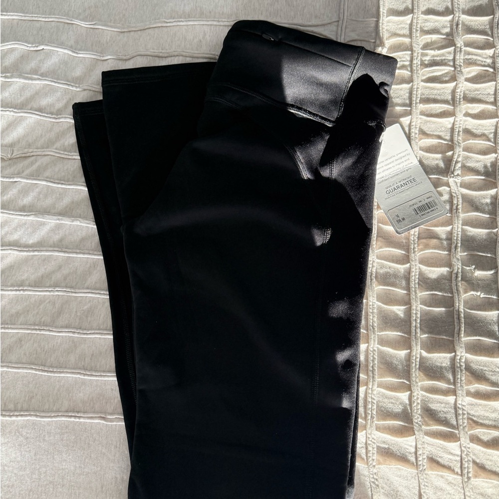 New Athleta bootcut fleece lined pants M